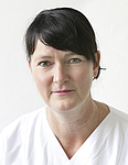 Krankenschwester mit dunklen Haaren, Hautklinik Unimedizin Rostock 